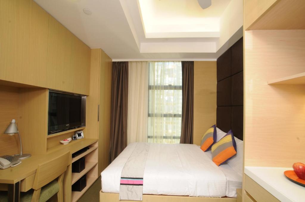 Aparthotel Causeway Corner Hongkong Zimmer foto